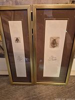 Both framed prints side by side