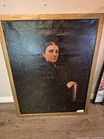 Front view of framed oil portrait painting