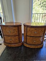 Front view of both matching burl wood side tables