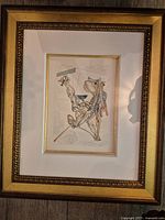 Framed Salvador Dali woodcut print, full view with mat and frame