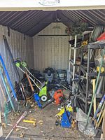 Wide view of shed showing majority of tools and equipment