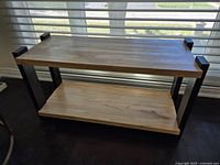 Front view of two-tier console table