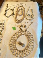 Overview of all jewellery items laid out on table
