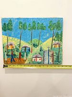 Front view of painting with measuring tape