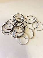 Pile of mixed-finish bangles displayed