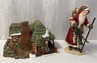 Santa figurine and cottage together