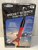 Front of Estes Rocket Science Starter Set box displaying age rating 10+ and product graphics
