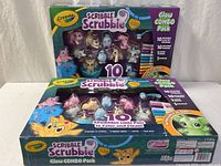Two sealed Crayola Scribble Scrubbie Glow Combo Packs front view