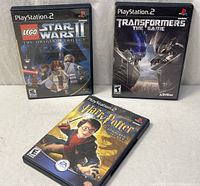 Front view of all three PS2 game cases