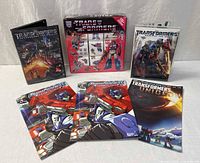 All items: 2 DVDs, sticker set, 3 comics