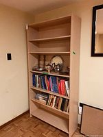 Front view of bookcase with shelves