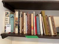 Books lined on shelf showing variety and quantity