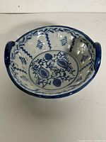 Top view of blue and white pierced ceramic dish