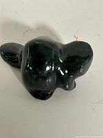 Top view of polished stone beaver figurine