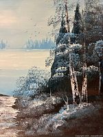 Left side close-up of trees and shoreline