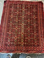 Full view of Balouchi rug showing overall design and condition