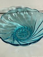 Overall view of blue scalloped swirl bowl