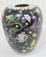 Full front view of vase showing primary dragon and floral enamel decoration