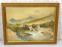 Front view of framed mountain river landscape painting