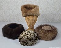Group shot of all four fur hats