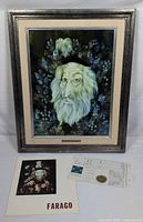 Framed artwork with accompanying brochure and paperwork