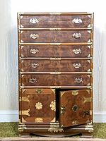 Front view showing full cabinet, brass hardware, open lower right door