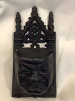 Full view of cast iron match holder