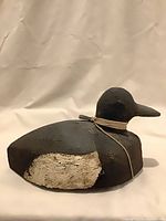 front angled view of entire duck decoy showing paint wear