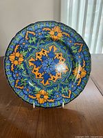 Front of plate showing colourful design