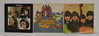 Front covers of all three Beatles LPs displayed side by side