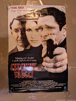 Full view of Executive Target poster showing images of lead actors and title