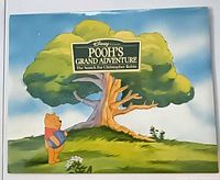 Front of sealed portfolio showing Pooh under tree and title block