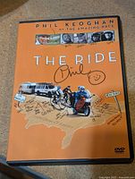 Front cover of DVD case with autograph