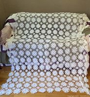 Full view draped over sofa showing overall size and pattern