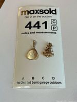 Both pendants side-by-side on MaxSold card