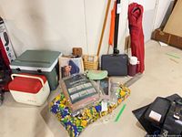 Group shot showing stove case, coolers, chair bag, bedding items