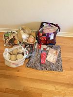 Entire lot with bags of yarn, needle organizer, pattern booklet