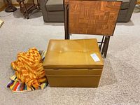 record storage box, TV tray set, crocheted throws