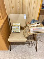 Telephone bench with attached table holding radio, phone, intercom