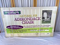 Front of boxed One Stop Gardens Natural Fir Adirondack Chair kit