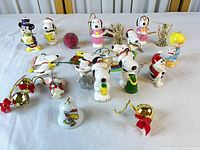 Full layout of assorted Snoopy, Mickey Mouse and accessory ornaments