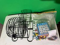 Bingo cage, bag with balls, cards, chips