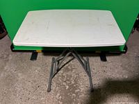 Top view of white plastic folding table