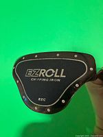 Back of EZ Roll chipping iron head showing branding