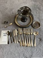 Lot overview: pedestal vase, tray, coaster, napkin ring, flatware array