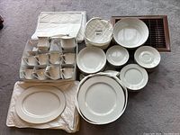 Full dinnerware set laid out showing quantity and pattern