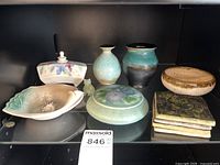Group shot of all ceramic items on shelf