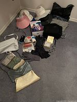 Group shot of all purses, hats, gloves, Handy Stitch, jewellery box, scarf