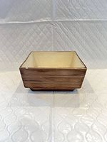 Front view of square ceramic planter