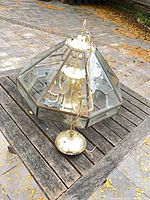 Full view of octagonal glass chandelier on table
